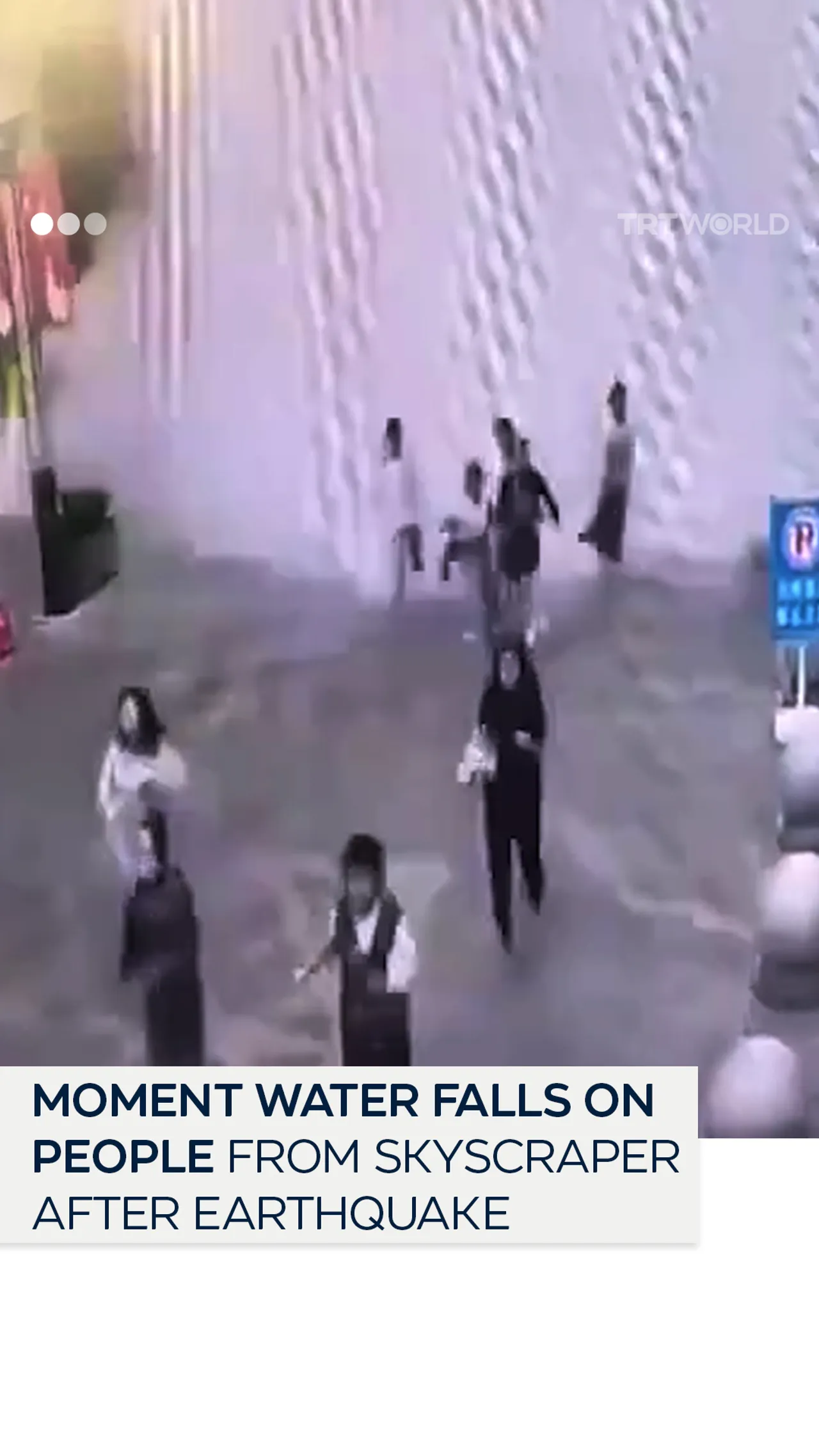 CCTV captures moment water pours from skyscraper onto crowd after earthquake
